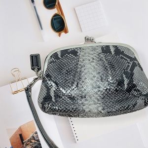 COACH BLACK MULTI PRINTED PYTHON FRAMED Clutch